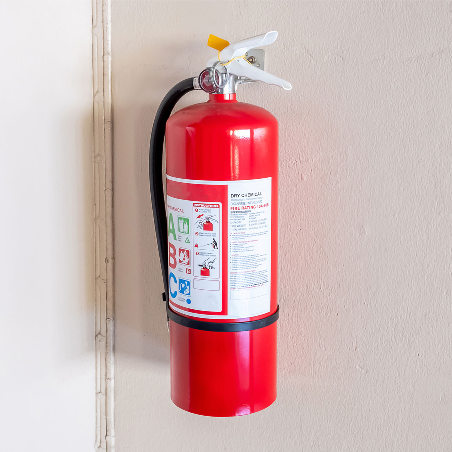 Fire extinguisher system on the wall background, powerful emerge